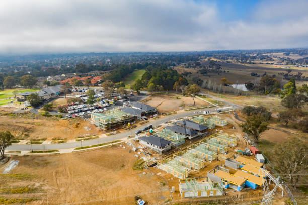 Aerial view of housing development and construction in a newly established suburb in the area of Ginninderry in Canberra, Australia stock photo