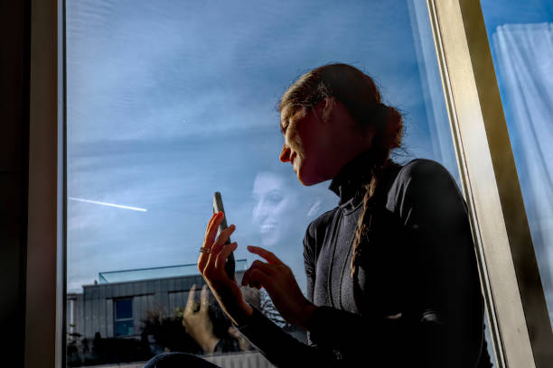 istock Russian model indoors mobile phone hdr 1203157762