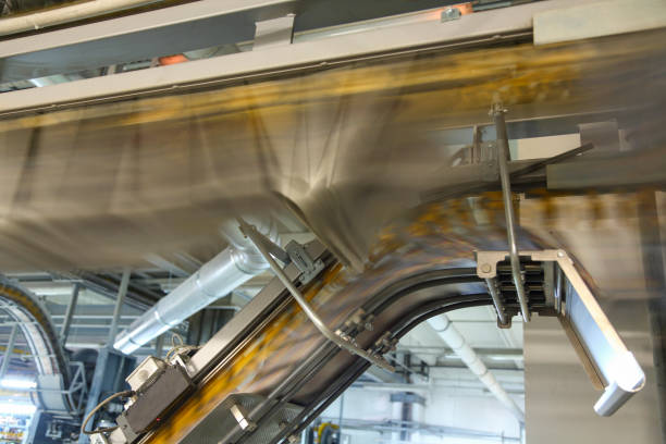 istock Printing press conveyor belt in a factory 1203161200