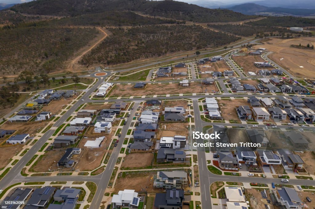 Aerial view of streets, houses and housing development in the newly established suburb of Denman Prospect in Canberra, Australia Canberra Stock Photo