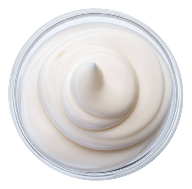 istock Mayonnaise swirl in glass bowl. Top view. Clipping path. 1203162083