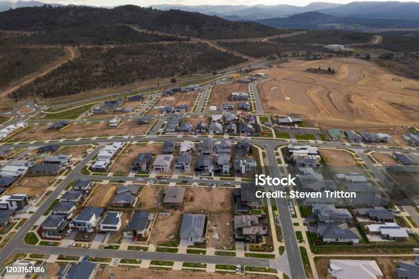 Aerial View Of Streets Houses And Housing Development In The Newly Established Suburb Of Denman Prospect In Canberra Australia Stock Photo - Download Image Now
