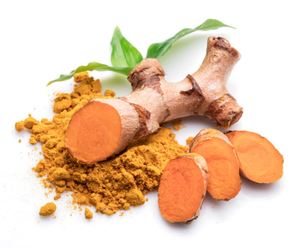 istock Fresh turmeric rhizome and turmeric powder isolated on white background. 1203162981