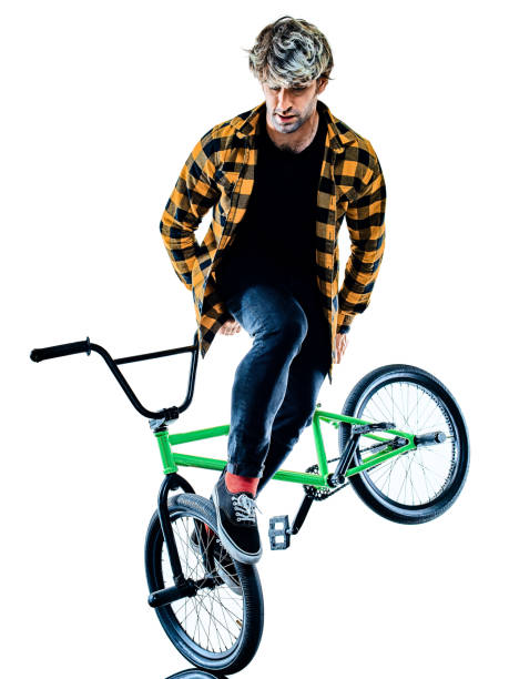 istock BMX rider cyclist cycling freestyle acrobatic stunt isolated white background 1203166316