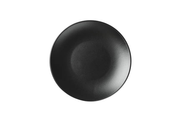 istock Black clean plate isolated on white background. Kitchen, serving 1203167852