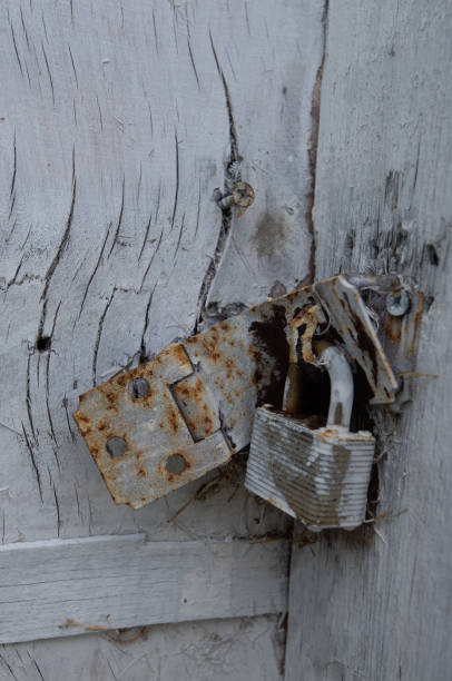 Pad lock on old door stock photo
