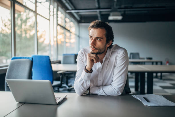 istock Modern businessman working in office 1203172455