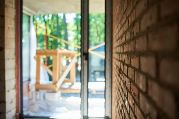 istock Building, construction site in progress to new house, brick wall in the room 1203174915