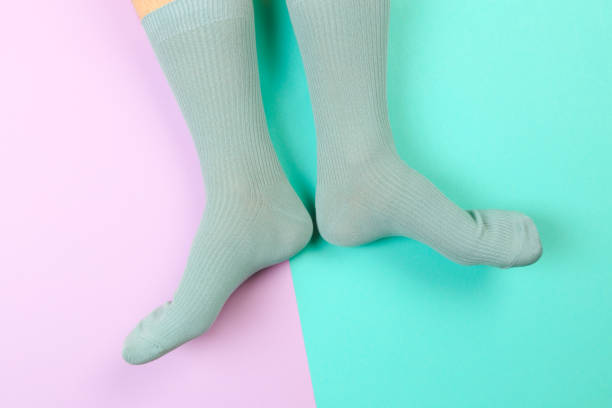 istock legs in colorful socks on colorful  background 1203176120