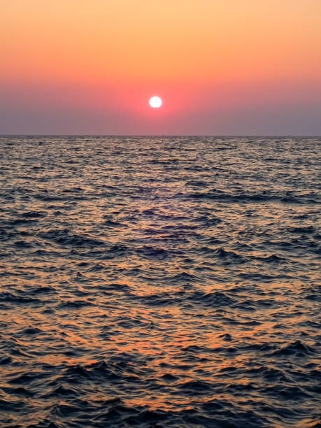 istock Beach sunset. Romantic beach sunset. Sunset on the beach. 1203176284