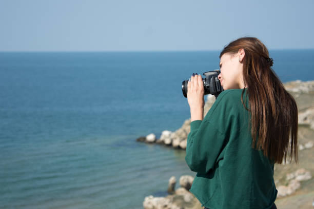 istock A photographer works with a model. 1203176682