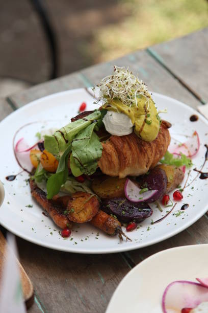 istock lunch and dinner with fried foods, fresh fruits, egg and avocado. 1203176713