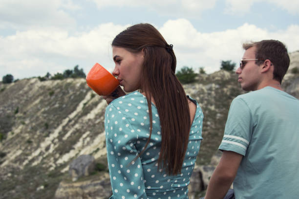 istock Campaign. Young attractive couple at the sea. 1203177300