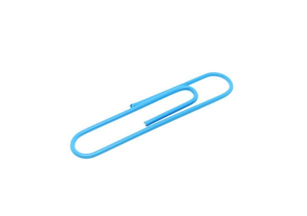 istock Single blue paper clip on a white background. One paper clip image 1203180530