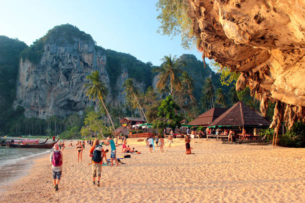 Ton Sai Beach, a scenic and tranquil beach in Krabi province, Thailand Tonsai, Thailand - December 6, 2019: Ton Sai Beach, a scenic and tranquil beach surrounded by trees and dramatic cliffs popular for rock climbing. ao ton sai stock pictures, royalty-free photos & images