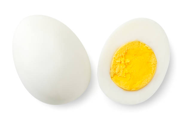 istock Boiled egg and half top view close-up on a white. Isolated 1203181913
