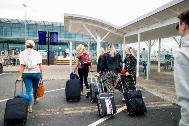 istock Group Arriving at the Airport 1203185170