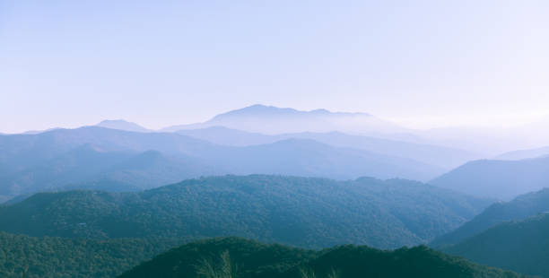 istock Foggy Mountains sunrise Nature Backgrounds 1203186535