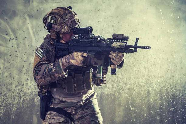istock Marine riders machine gunner landing on coast 1203186825