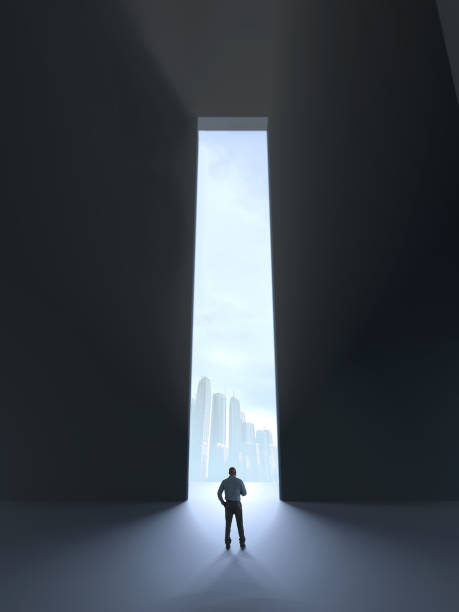 istock man standing in front of an open door 1203189322