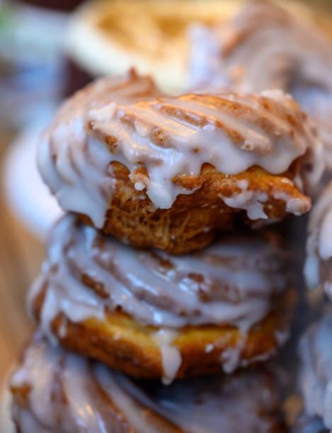 istock Scottish cream choux buns with white icing close up 1203190282