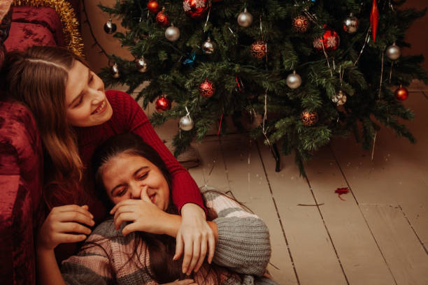 istock Two girl are celebrating Christmas 1203191981