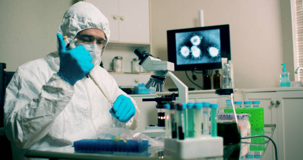 istock A lab technician or research scientist with a sample of the Wuhan Coronavirus virus working in his laboratory in hopes of developing a vaccine. 1203192105