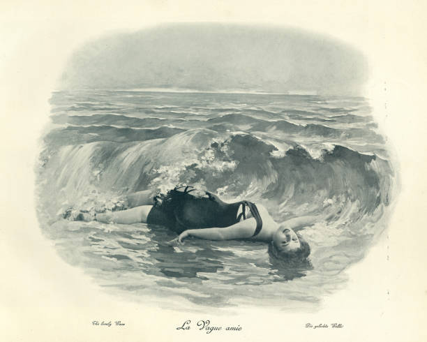 Woman frolicking in the waves at the seaside, Victorian photograph Antique photograph, Woman frolicking in the waves at the seaside, 1890s, La Vague amie, the lovely wave. 19th Century victorian swimwear stock pictures, royalty-free photos & images