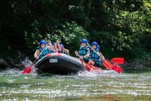 istock Rafting team goes down the river on the beautiful sunny day. 1203195934