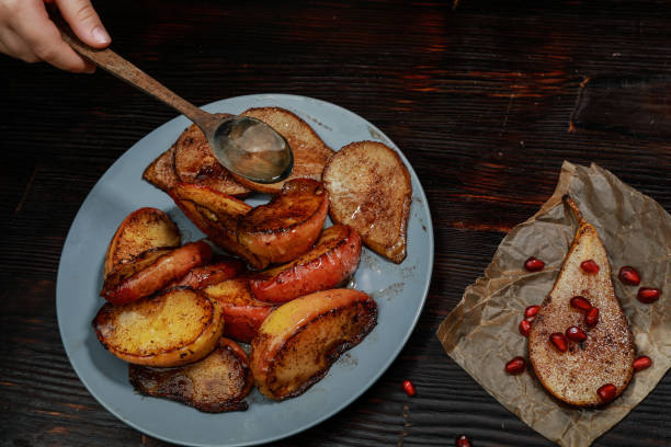 istock fried apple and pear slices with cinnamon and honey 1203198662