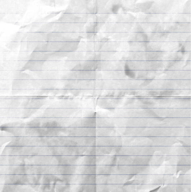 istock wrinkled and folded lined writing paper background 1203202469