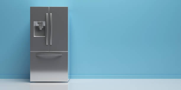 frigorifero fianco a fianco sul pavimento della cucina, sfondo della parete blu, spazio di copia. illustrazione 3d - frigorifero foto e immagini stock