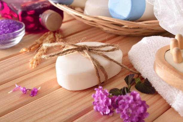 istock Massage and bath products on wooden table elevated 1203204522