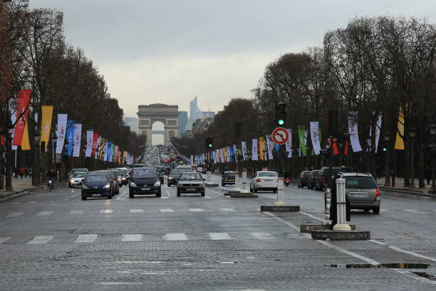 Champs Elysees and Triumph Arc Champs Elysees and Triumph Arc in Paris. Picture taken in 2016 february in french capital. cars driving on the road australian rugby championship stock pictures, royalty-free photos & images