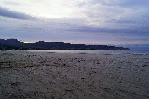 Fermoyle Strand, Trá Fhormaoileach is a sandy beach near the village of Cloghane.
