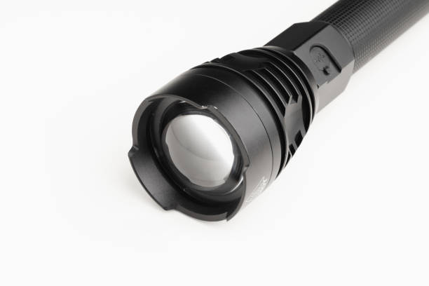 istock black pocket flashlight with zoom lens, white background 1203217940