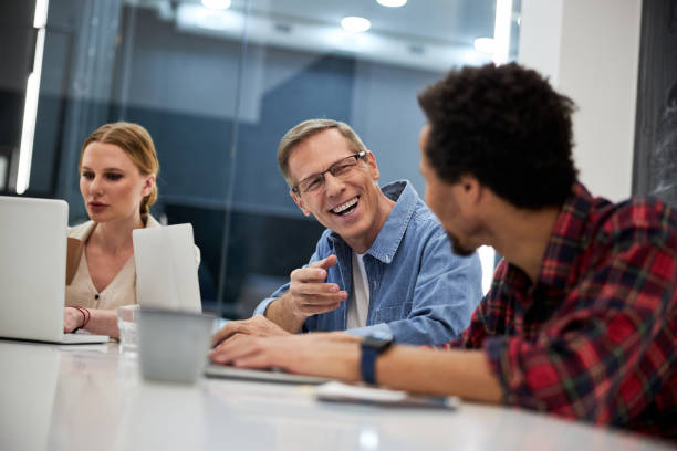 istock Business colleagues communicating and working together in office 1203227413