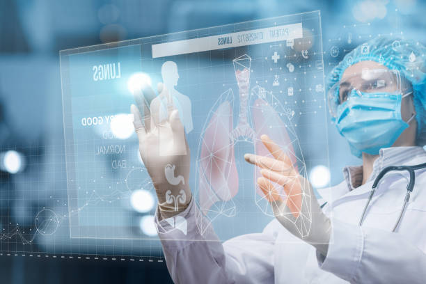 istock The doctor work on the virtual computer screen with the lungs of the patient . 1203227795