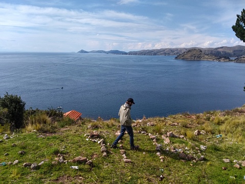 Lake Titicaca, straddling the border between Peru and Bolivia in the Andes Mountains, is one of South America's largest lakes and the world’s highest navigable body of water.