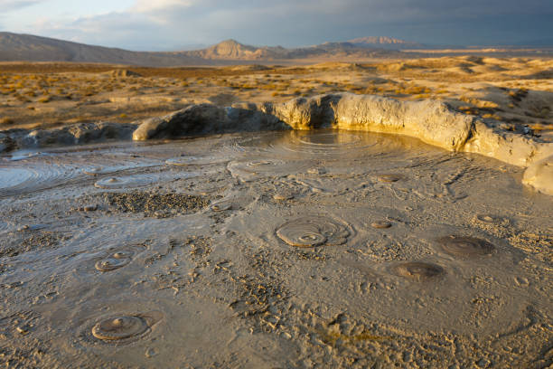 istock mud volcano crater, Gobustan, Azerbaijan 1203229275
