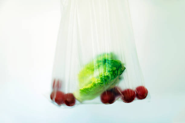 istock lettuce and tomatoes in a plastic bag 1203229315