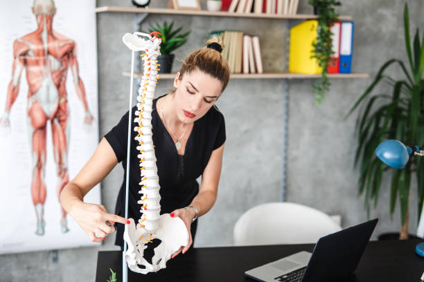 istock University female teacher preparing students for educational exam 1203233719