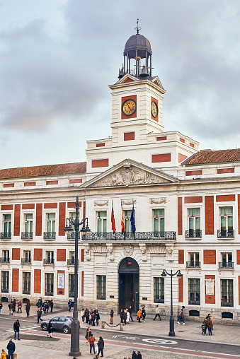Madrid, Spain - January 29, 2020. Principal facade of The Real Casa de Correos Palace (Royal Post Office) Puerta del Sol square, Madrid. Spain.