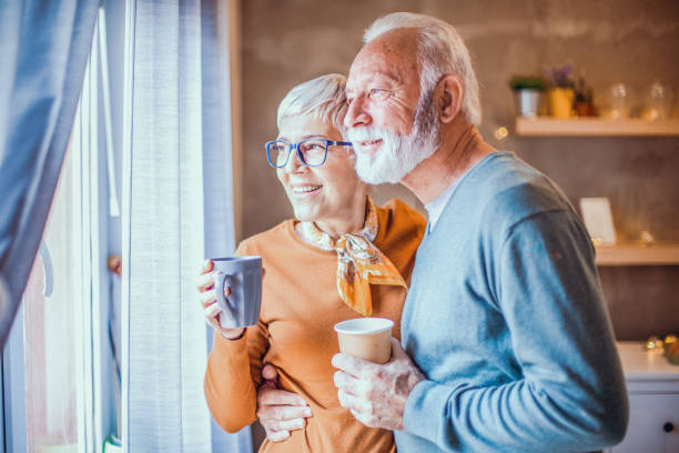 istock Beautiful senior couple drinking coffee. 1203241026