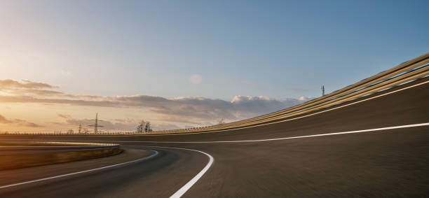 Race Car / motorcycle racetrack after rain on a sunny day. Fast motion blur effect. Ready to race stock photo