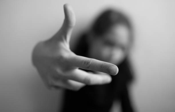 istock Little girl shows thumb up 1203242258