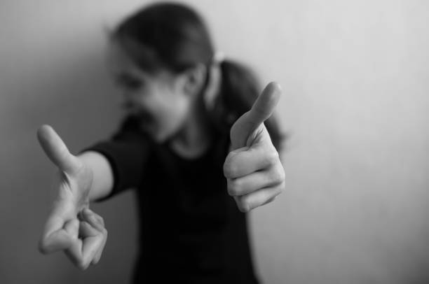 istock Little girl shows thumb up 1203242269