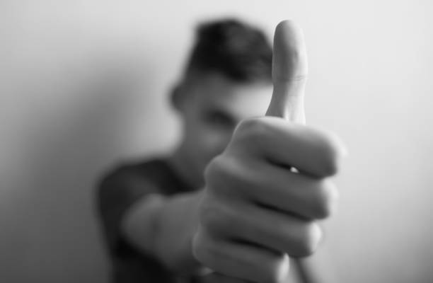 istock Teen boy shows thumb up on 1203242271