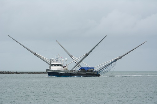 The Space X vessel Go Miss Tree passes the Jetty at Port Canaveral. The ship's mission is to capture the fairing of the rocket so it can be reused. It was successful in doing that on January 1 , 2020 and returned the next day with half of the nosecone.