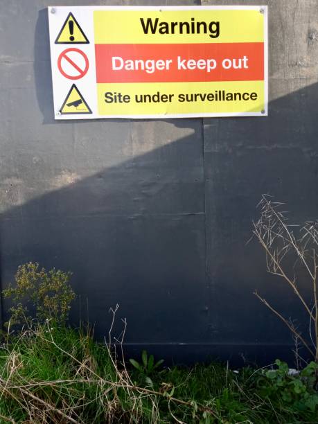 istock Yellow red and black warning sign for construction site 1203248498